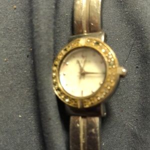 Women’s sterling silver Bulova watch. Missing a stone and needs a new battery